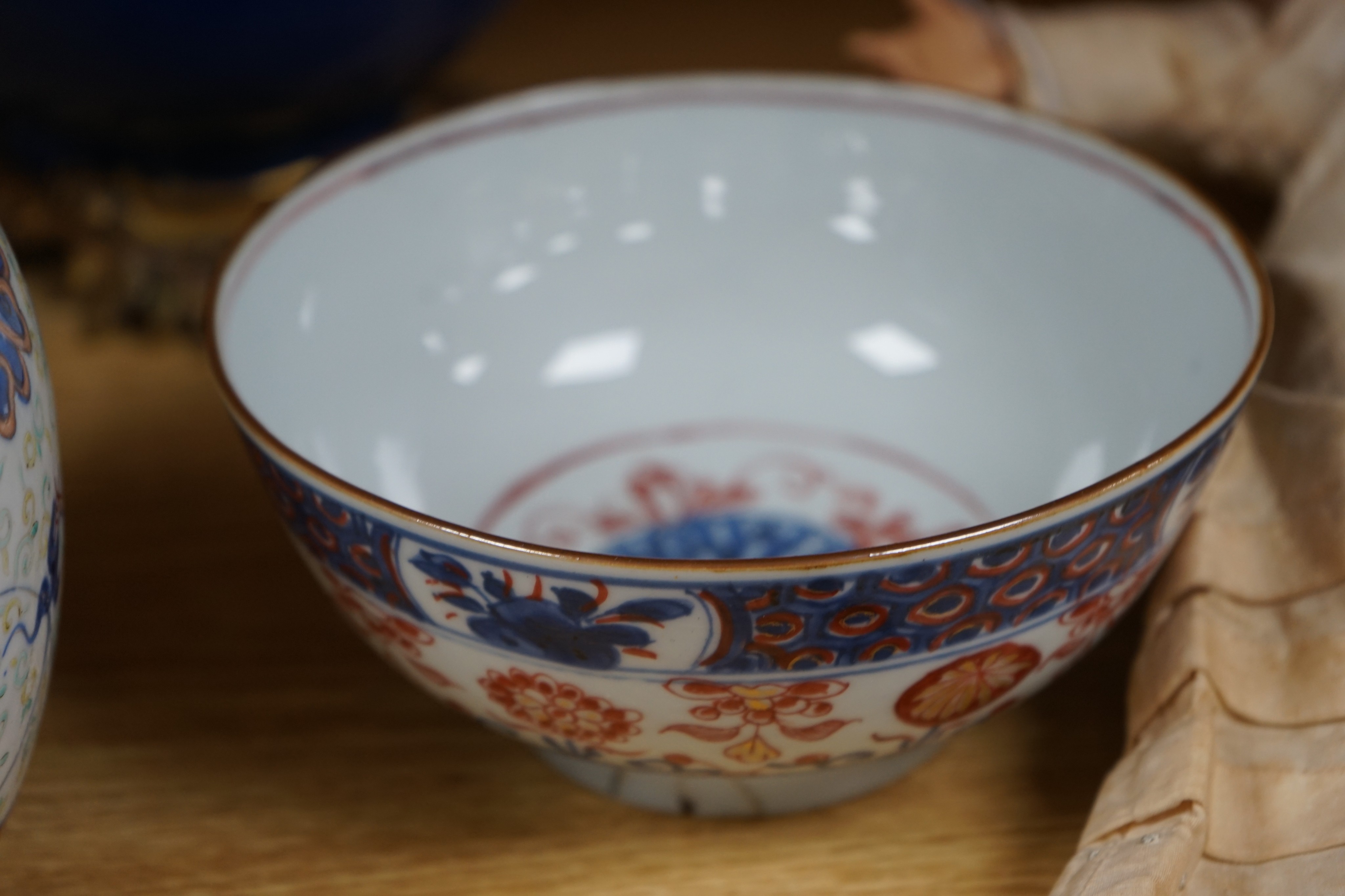 An 18th century Chinese clobbered blue and white bowl, a Samson powder blue ormolu mounted bowl, 19.5cm wide and a 19th century Chinese doucai style jar